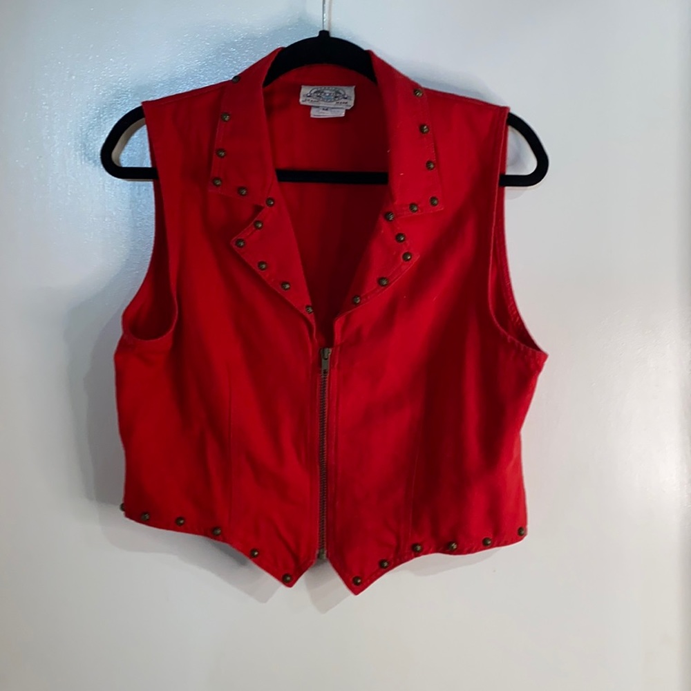 Red vest with brass buttons along edges!